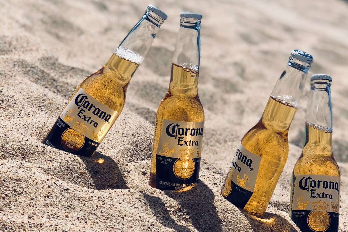 Beer bottles in the sand